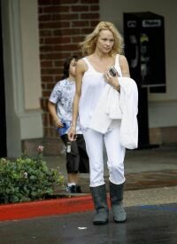 Pamela Anderson in the rain in Malibu